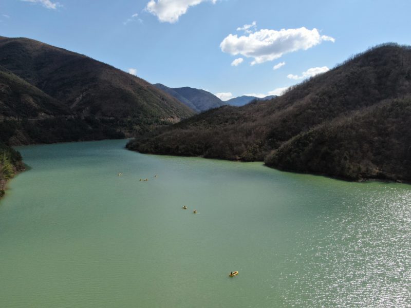 Packrafting in Ulza Lake scaled e1616671597728